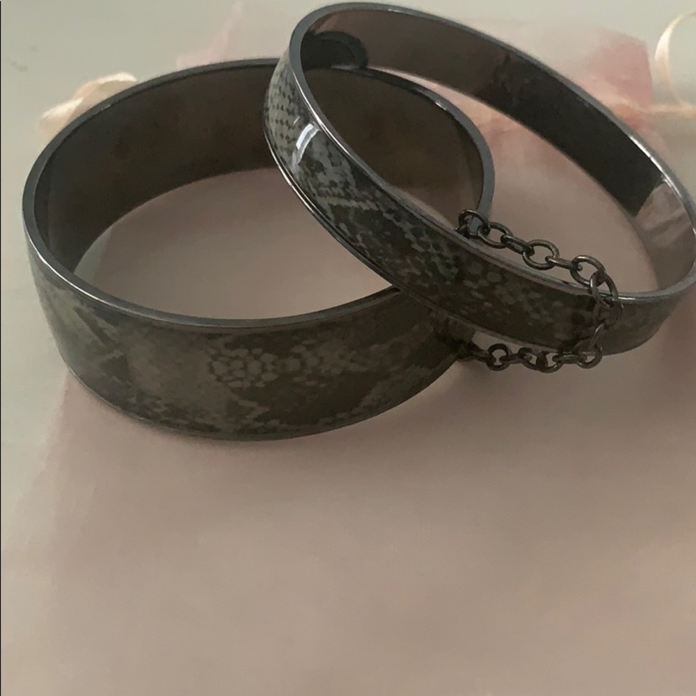 Two snake print bracelets